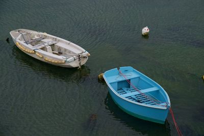 High angle view of boats moored in lake