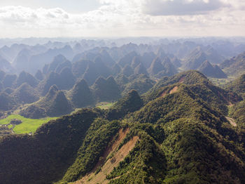 Scenic view of mountain range against cloudy sky in vietnam 