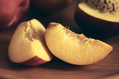 High angle view of peach on wooden table