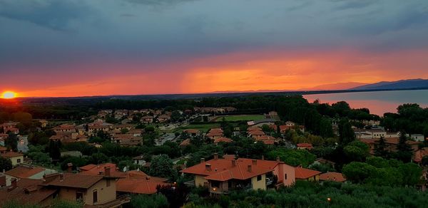 High angle view of townscape against sky at sunset