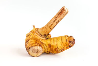 Close-up of bananas against white background