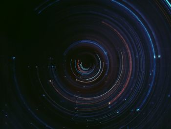 Close-up of spiral water at night