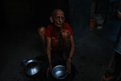 Portrait of an old  woman looking away