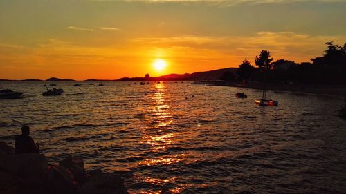 Scenic view of sea against sky during sunset