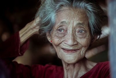 Close-up of senior woman looking away