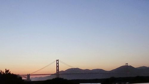 Suspension bridge at sunset