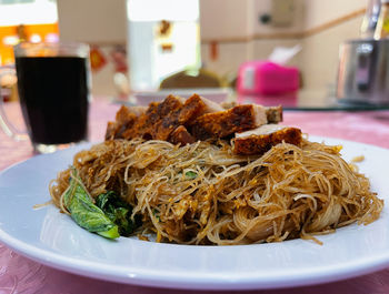 Close-up of noodles served in plate