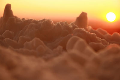 Close-up of snow during sunset