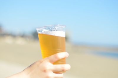 Cropped hand holding ice cream