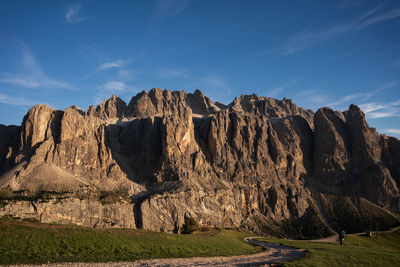 Panoramic view of rocky mountains against sky