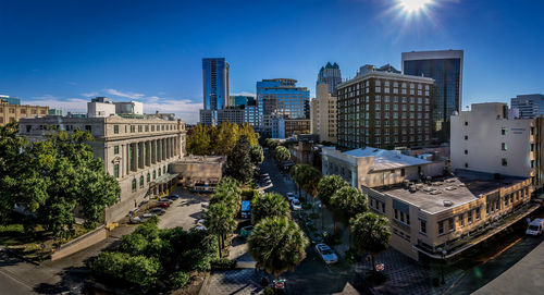 Downtown district against sky