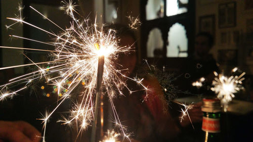 Close-up of firework display at night