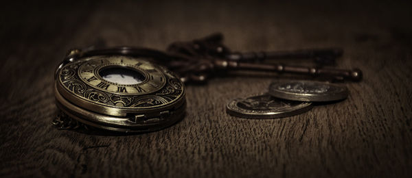 High angle view of clock on table