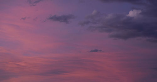 Low angle view of dramatic sky during sunset