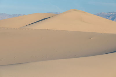 Scenic view of desert against sky