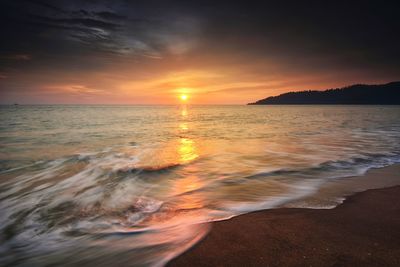 Scenic view of sea during sunset
