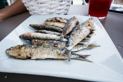 Close-up of fish in plate on table