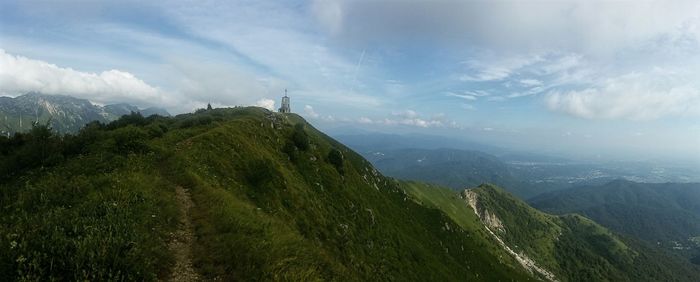 Scenic view of grassy mountains