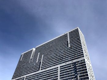 Low angle view of modern building against sky