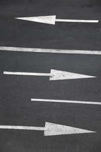 Arrow symbol on road