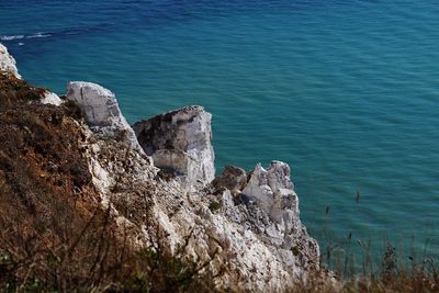 High angle view of rocks on beach