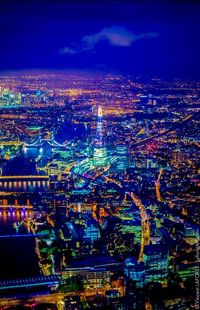 Illuminated cityscape at night