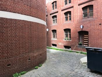 Narrow street amidst buildings