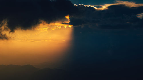 Scenic view of dramatic sky during sunset