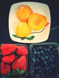 High angle view of fruits in bowl on table