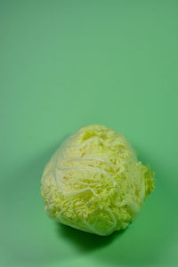 Close-up of fresh green over white background