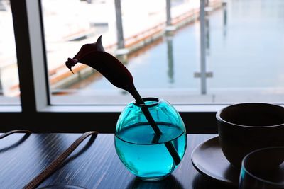 Close-up of drinking glass on table