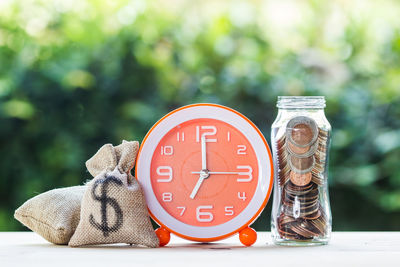 Close-up of clock on table