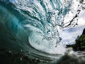 Close-up of sea waves against sky