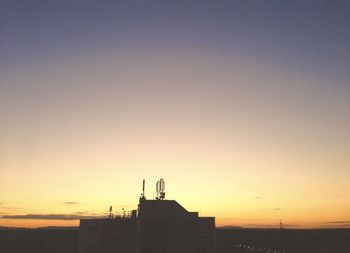 View of built structure at sunset