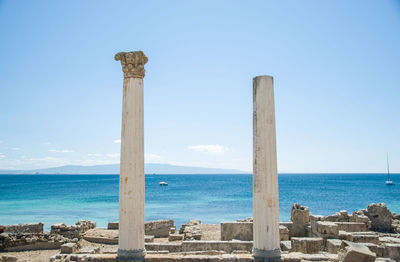 Scenic view of sea against blue sky