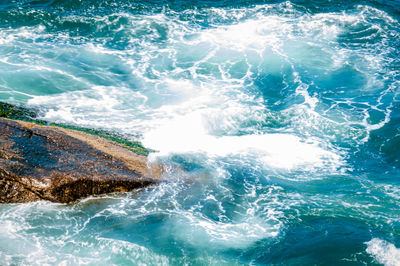 Sea water splashing at shore