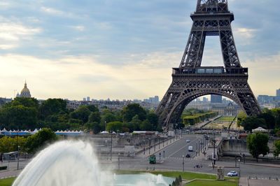 High angle view of eiffel tower against cloudy sky