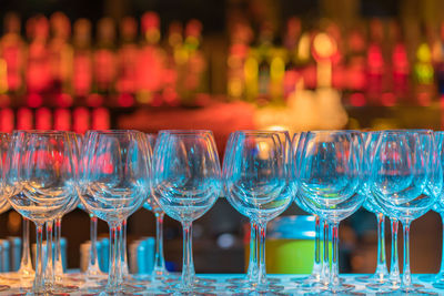 Close-up of wine glasses on table