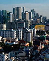 High angle view of buildings in city against sky