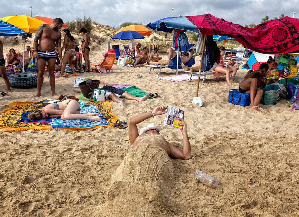 PEOPLE ENJOYING AT BEACH