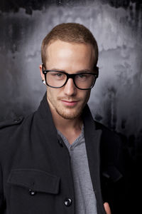 Portrait of young man wearing eyeglasses