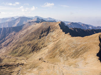 Scenic view of mountain range against sky