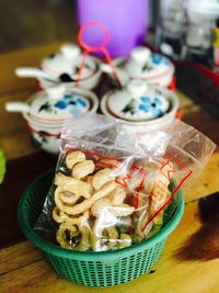Close-up of cake in basket on table