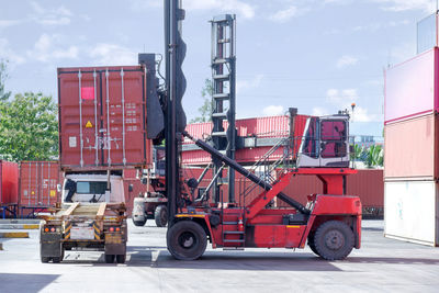 View of red truck against sky