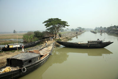 Traditional fishing boat in the delta of the ganges river , sundarbans jungle national park in india