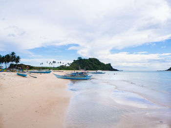 Scenic view of beach against sky