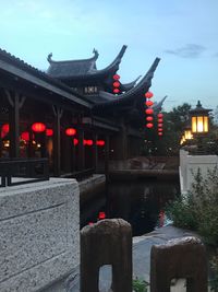 Illuminated lanterns against sky