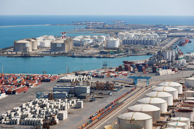 Barcelona sea port tanks and containers seen from above, spain.