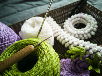 High angle view of multi colored pencils in basket