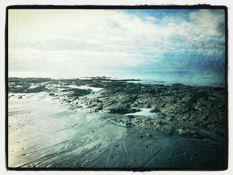 transfer print, sky, auto post production filter, water, sea, beach, tranquil scene, scenics, tranquility, beauty in nature, cloud - sky, nature, horizon over water, shore, cloudy, sand, cloud, weather, idyllic, day